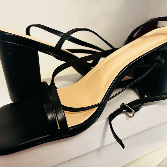 All black heels. Wraps around ankle. Size 10. Been wore once. - Picture 2 of 2